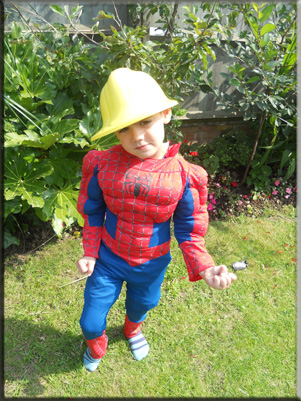 Child in spiderman costume